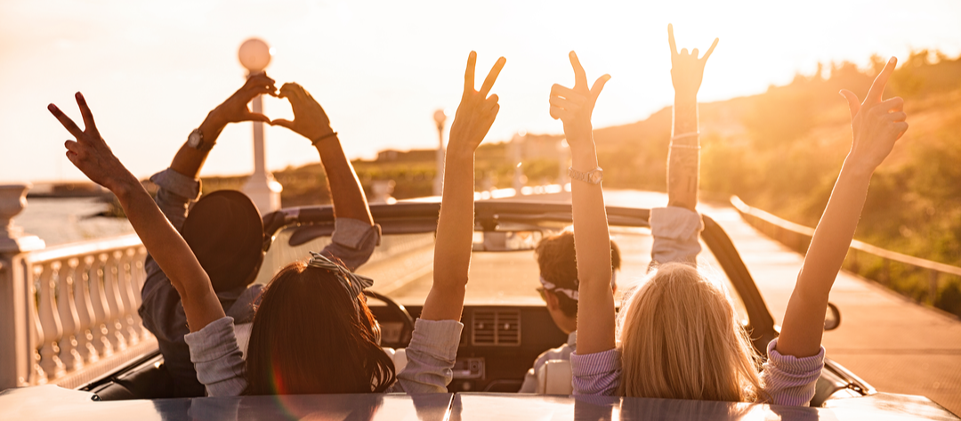 group-happy-young-friends-cabriolet-raised-summer road trip