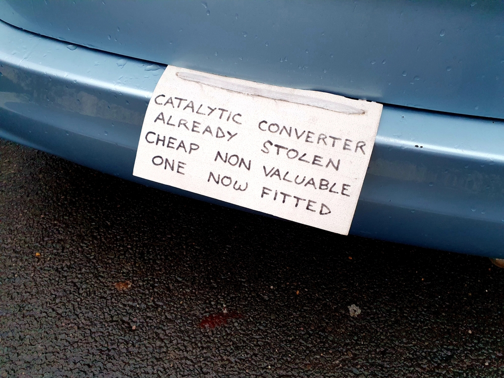 Sign On Vehicle Warning Catalytic converter already